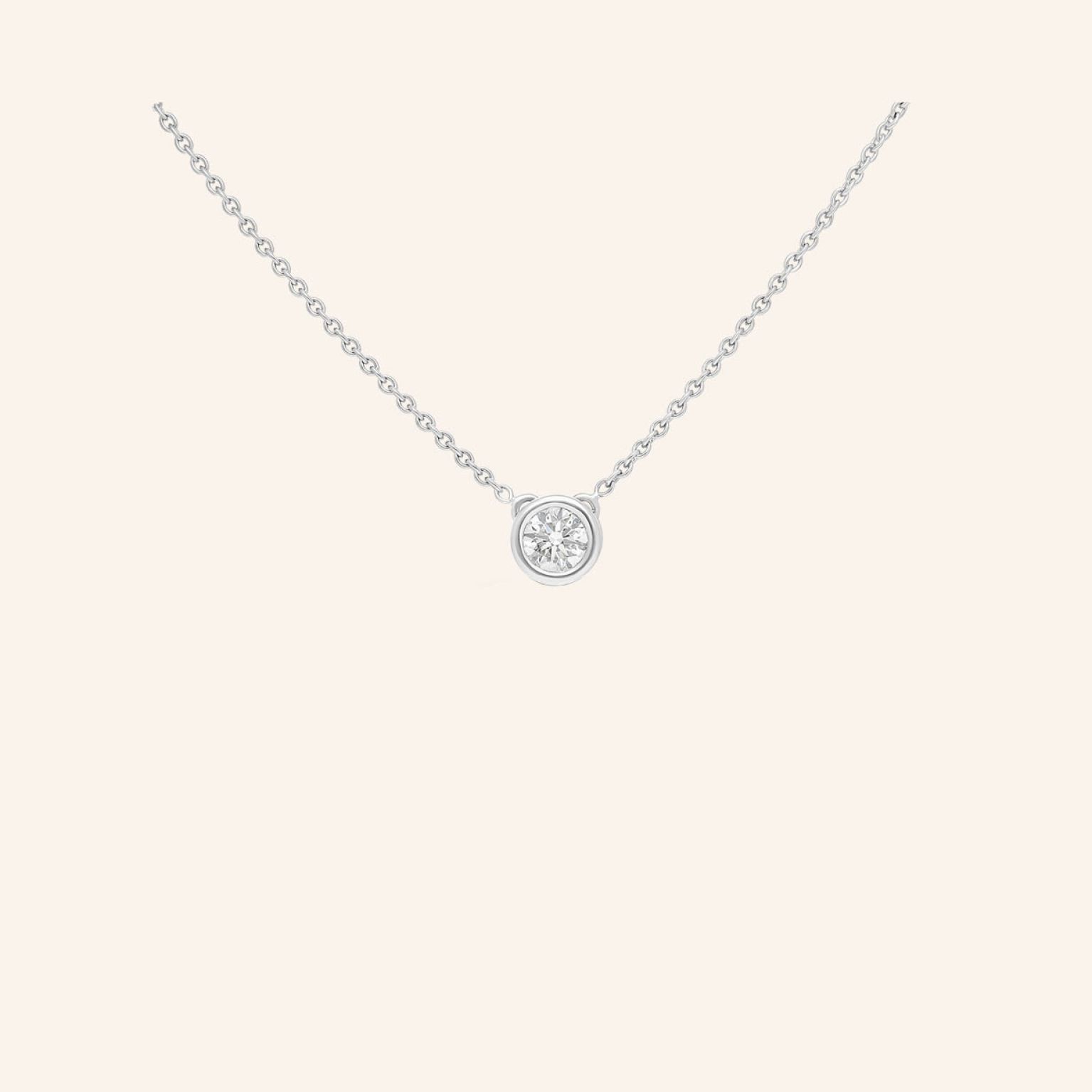 Collier or gris et diamant