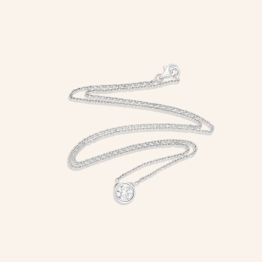 Collier or gris et diamant